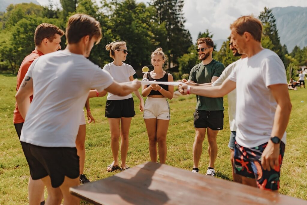 Alex Griffiths with Celtra team members collaborating on a teambuilding.